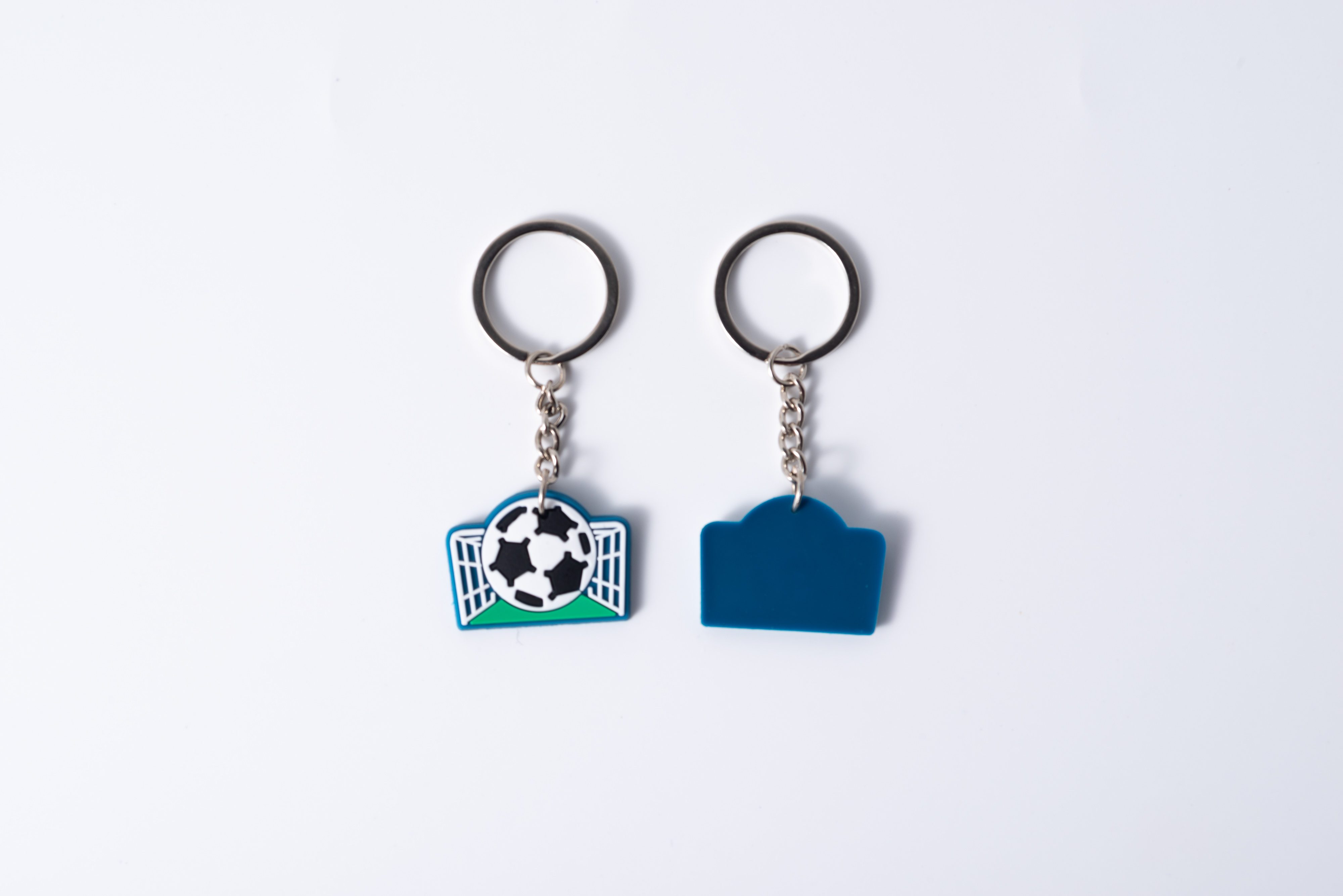 Custom PVC keychains layout showing various 2D and 3D designs